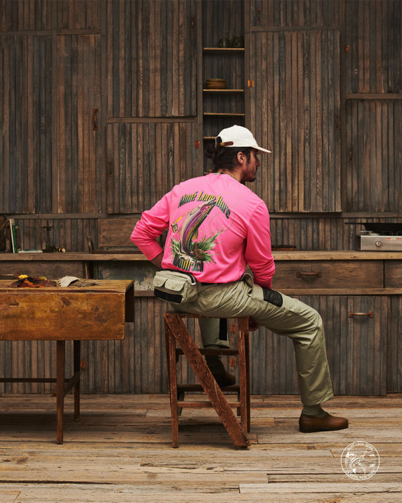 A Man In A Cowboy Hat Fly Fishing Wood Print